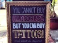 You cannot buy happiness but you can buy tattoos and that is almost the same